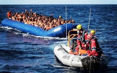 Migrants crossing the sea by boat - picture courtesy of Karam Yahya