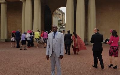 Dr Mutwarasibo outside Buckingham Palace