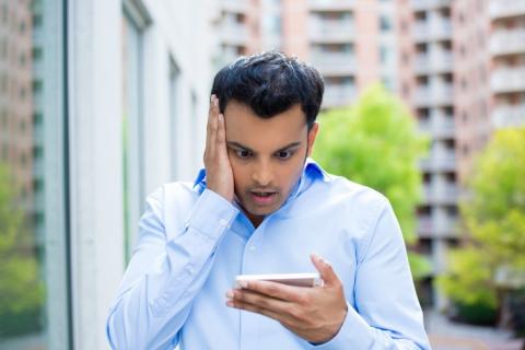 Man looking at phone.