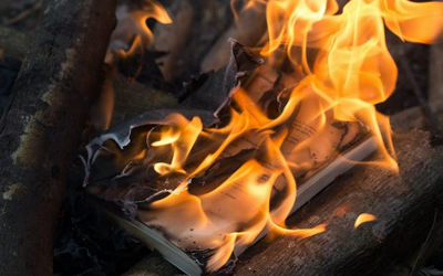 Books being burned in a fire