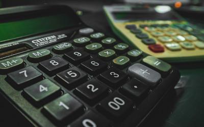 Two calculators adjacent to each other