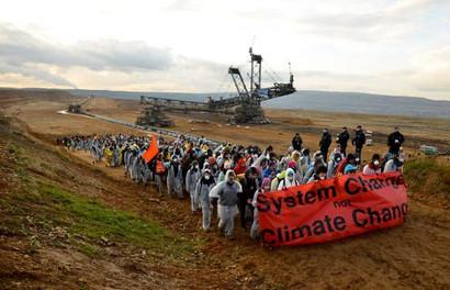 Protesters of climate activist group Ende Gelaende at the Hambach opencast coal mine in Germany. Phillip Guelland/EPA 