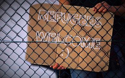 A sign saying 'Refugees Welcome'