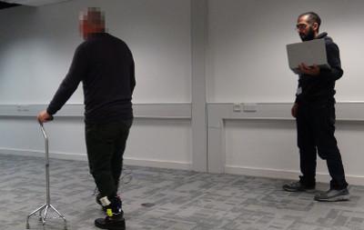 Man walking with haptic aids