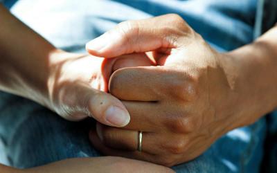Two hands intertwined