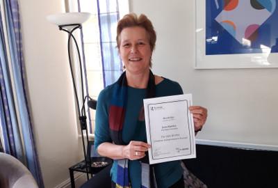 Jean Hartley with her award