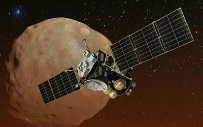Space ship orbiting one of Mars' moons
