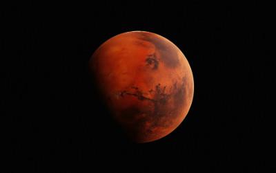 The planet Mars against a black background