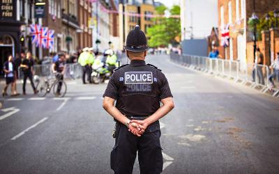 Policeman standing in the road
