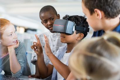 Shutterstock-1086016091 Child with virtual reality headset in classroom