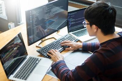 Programmer working on a PC