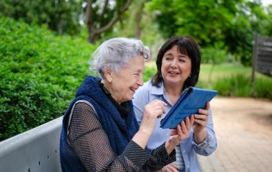 Mother and daughter with tablet
