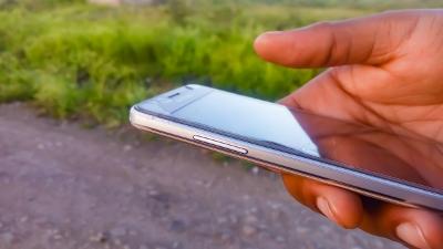 Person holding a mobile phone