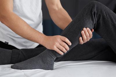 Person having physio on leg