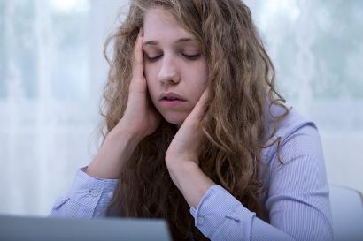 Girl looking at laptop
