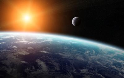 View of Earth and sunrise and Moon in the distance