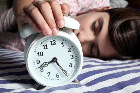 Shutterstock-525533599 Child and alarm clock