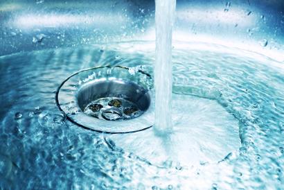 Shutterstock-610050113 Water running down a drain