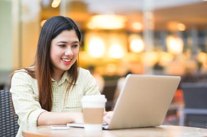 Shutterstock-695842726 Student working on a laptop