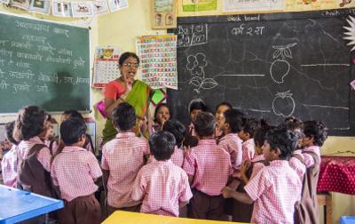 Indian classroom with children and teacher