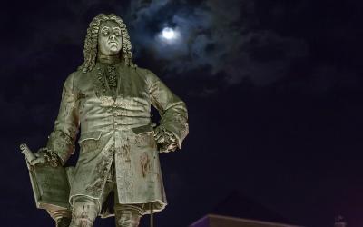 George Handel monument with sky and moon in the background