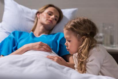 Shutterstock-785095084 Daughter with sick mother in hospital