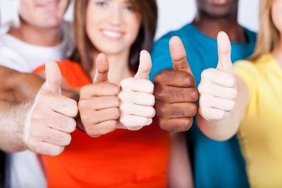 Students with their thumbs up
