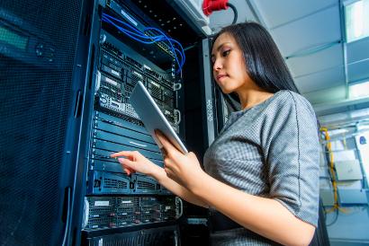 Shutterstock-349353287 Woman with tablet in network server room